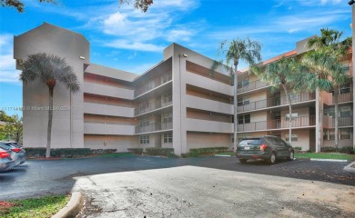 Beautiful 3/2 condo with serene lake and golf course views in on Pine Island Ridge Country Club in Florida - for sale on GolfHomes.com, golf home, golf lot