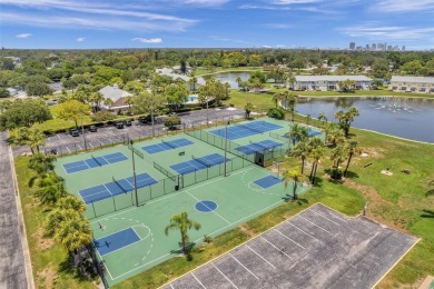 Once you pull through the gate you will not want to leave this on St. Petersburg Country Club in Florida - for sale on GolfHomes.com, golf home, golf lot