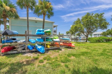 Once you pull through the gate you will not want to leave this on St. Petersburg Country Club in Florida - for sale on GolfHomes.com, golf home, golf lot