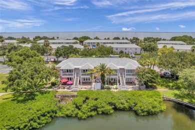 Once you pull through the gate you will not want to leave this on St. Petersburg Country Club in Florida - for sale on GolfHomes.com, golf home, golf lot