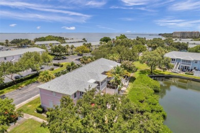 Once you pull through the gate you will not want to leave this on St. Petersburg Country Club in Florida - for sale on GolfHomes.com, golf home, golf lot