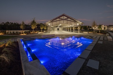 This stunning new home built by Dune Construction features the on Origins Golf Club in Florida - for sale on GolfHomes.com, golf home, golf lot