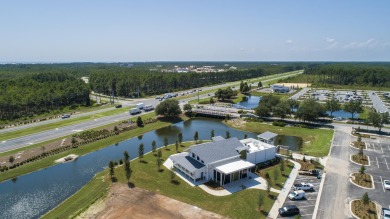 This stunning new home built by Dune Construction features the on Origins Golf Club in Florida - for sale on GolfHomes.com, golf home, golf lot