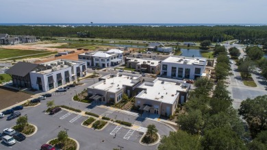 This stunning new home built by Dune Construction features the on Origins Golf Club in Florida - for sale on GolfHomes.com, golf home, golf lot