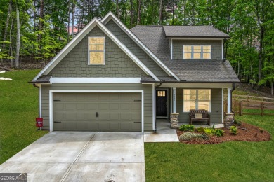 Ready to call this recently built home in Lake Arrowhead on The Highlands Course at Lake Arrowhead in Georgia - for sale on GolfHomes.com, golf home, golf lot