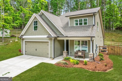 Ready to call this recently built home in Lake Arrowhead on The Highlands Course at Lake Arrowhead in Georgia - for sale on GolfHomes.com, golf home, golf lot