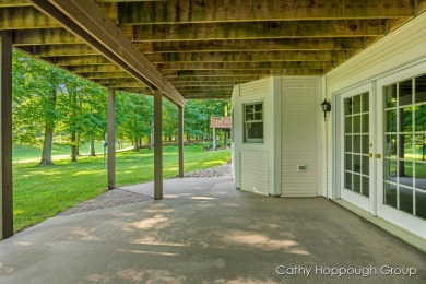 Relaxation and location are the hallmarks of this beautiful on St. Ives Golf Club in Michigan - for sale on GolfHomes.com, golf home, golf lot