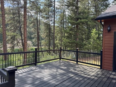 Welcome to your Montana dream retreat! This exceptional property on Trestle Creek Golf Course in Montana - for sale on GolfHomes.com, golf home, golf lot