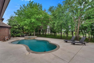 Elegant European style two story home on Lantana Golf course on Lantana Golf Club in Texas - for sale on GolfHomes.com, golf home, golf lot