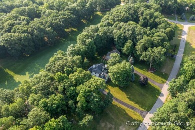 Relaxation and location are the hallmarks of this beautiful on St. Ives Golf Club in Michigan - for sale on GolfHomes.com, golf home, golf lot