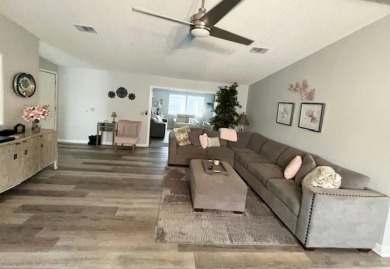 This beautifully updated 2bd, 2ba home is situated on a private on Del Tura Golf and Country Club in Florida - for sale on GolfHomes.com, golf home, golf lot