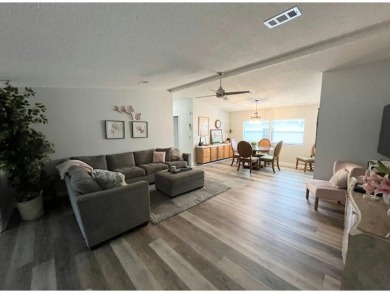 This beautifully updated 2bd, 2ba home is situated on a private on Del Tura Golf and Country Club in Florida - for sale on GolfHomes.com, golf home, golf lot
