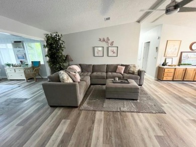 This beautifully updated 2bd, 2ba home is situated on a private on Del Tura Golf and Country Club in Florida - for sale on GolfHomes.com, golf home, golf lot