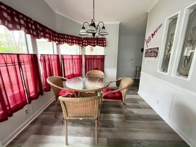This beautifully updated 2bd, 2ba home is situated on a private on Del Tura Golf and Country Club in Florida - for sale on GolfHomes.com, golf home, golf lot