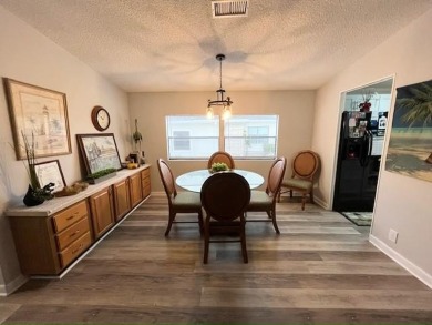 This beautifully updated 2bd, 2ba home is situated on a private on Del Tura Golf and Country Club in Florida - for sale on GolfHomes.com, golf home, golf lot