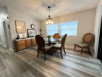 This beautifully updated 2bd, 2ba home is situated on a private on Del Tura Golf and Country Club in Florida - for sale on GolfHomes.com, golf home, golf lot