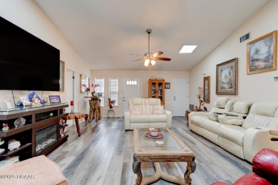 Step inside this beautifully updated 3-bedroom, 2-bath, 2-car on The Club At Pelican Bay - North Course in Florida - for sale on GolfHomes.com, golf home, golf lot