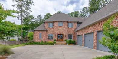 Stunning Reunion Golf Course Home with Luxurious Amenities! on Reunion Golf Club in Mississippi - for sale on GolfHomes.com, golf home, golf lot