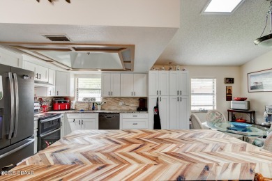 Step inside this beautifully updated 3-bedroom, 2-bath, 2-car on The Club At Pelican Bay - North Course in Florida - for sale on GolfHomes.com, golf home, golf lot