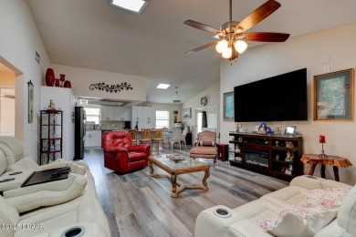 Step inside this beautifully updated 3-bedroom, 2-bath, 2-car on The Club At Pelican Bay - North Course in Florida - for sale on GolfHomes.com, golf home, golf lot