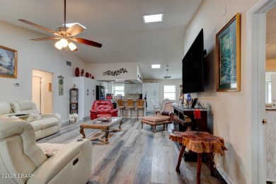Step inside this beautifully updated 3-bedroom, 2-bath, 2-car on The Club At Pelican Bay - North Course in Florida - for sale on GolfHomes.com, golf home, golf lot