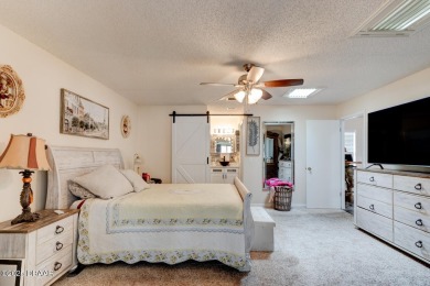 Step inside this beautifully updated 3-bedroom, 2-bath, 2-car on The Club At Pelican Bay - North Course in Florida - for sale on GolfHomes.com, golf home, golf lot