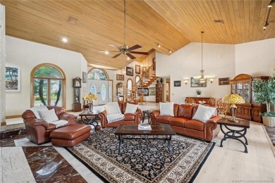 Step into country club living at its finest in this expansive on Pipers Landing Country Club in Florida - for sale on GolfHomes.com, golf home, golf lot