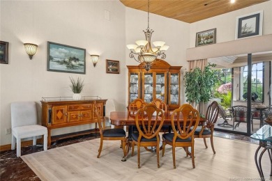 Step into country club living at its finest in this expansive on Pipers Landing Country Club in Florida - for sale on GolfHomes.com, golf home, golf lot