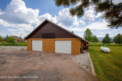 Experience luxury living in this beautiful home, perfectly on Cedar Creek Golf Course in Wyoming - for sale on GolfHomes.com, golf home, golf lot