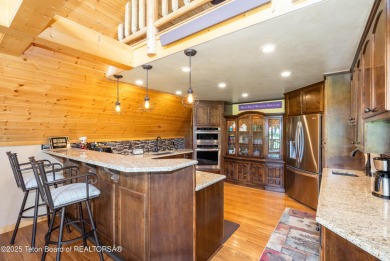 Experience luxury living in this beautiful home, perfectly on Cedar Creek Golf Course in Wyoming - for sale on GolfHomes.com, golf home, golf lot
