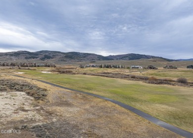 Great flat and buildable lot on the first (#1) green of Grand on Grand Elk Ranch and Club in Colorado - for sale on GolfHomes.com, golf home, golf lot