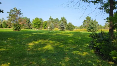 Can you imagine living on a golf course, accessing the on Maplewood Golf Course in Wisconsin - for sale on GolfHomes.com, golf home, golf lot