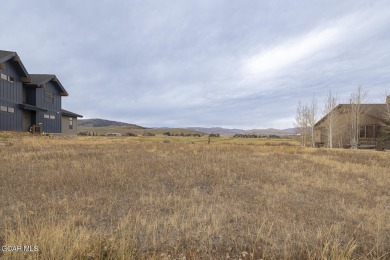 Great flat and buildable lot on the first (#1) green of Grand on Grand Elk Ranch and Club in Colorado - for sale on GolfHomes.com, golf home, golf lot