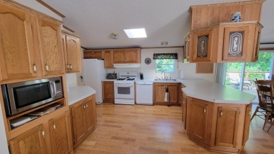 Can you imagine living on a golf course, accessing the on Maplewood Golf Course in Wisconsin - for sale on GolfHomes.com, golf home, golf lot