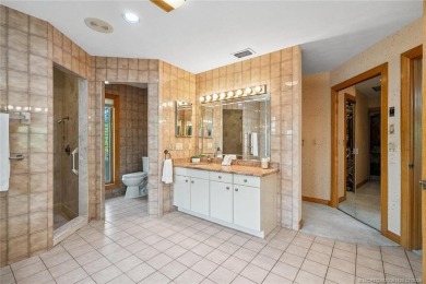 Step into country club living at its finest in this expansive on Pipers Landing Country Club in Florida - for sale on GolfHomes.com, golf home, golf lot