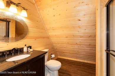 Experience luxury living in this beautiful home, perfectly on Cedar Creek Golf Course in Wyoming - for sale on GolfHomes.com, golf home, golf lot