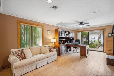 Step into country club living at its finest in this expansive on Pipers Landing Country Club in Florida - for sale on GolfHomes.com, golf home, golf lot