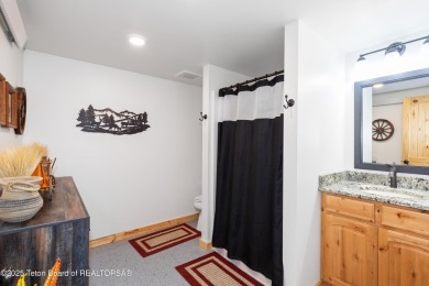 Experience luxury living in this beautiful home, perfectly on Cedar Creek Golf Course in Wyoming - for sale on GolfHomes.com, golf home, golf lot