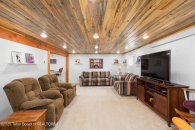 Experience luxury living in this beautiful home, perfectly on Cedar Creek Golf Course in Wyoming - for sale on GolfHomes.com, golf home, golf lot