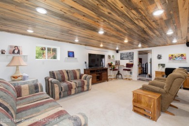 Experience luxury living in this beautiful home, perfectly on Cedar Creek Golf Course in Wyoming - for sale on GolfHomes.com, golf home, golf lot