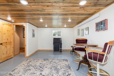 Experience luxury living in this beautiful home, perfectly on Cedar Creek Golf Course in Wyoming - for sale on GolfHomes.com, golf home, golf lot