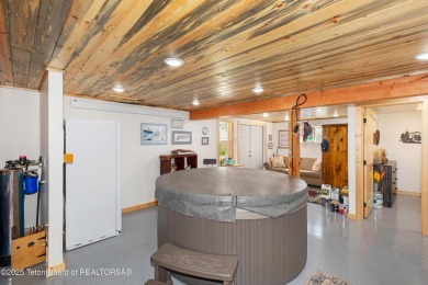 Experience luxury living in this beautiful home, perfectly on Cedar Creek Golf Course in Wyoming - for sale on GolfHomes.com, golf home, golf lot