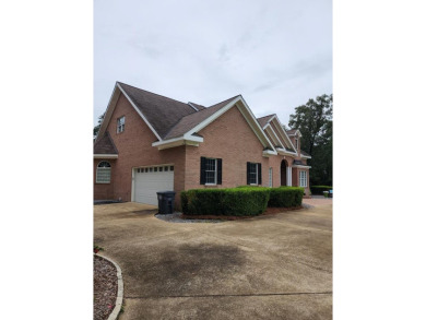 This Stunning 3-Bedroom Luxury Home with 4.5 Baths & Upstairs on Donalsonville Country Club in Georgia - for sale on GolfHomes.com, golf home, golf lot