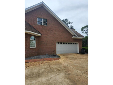 This Stunning 3-Bedroom Luxury Home with 4.5 Baths & Upstairs on Donalsonville Country Club in Georgia - for sale on GolfHomes.com, golf home, golf lot