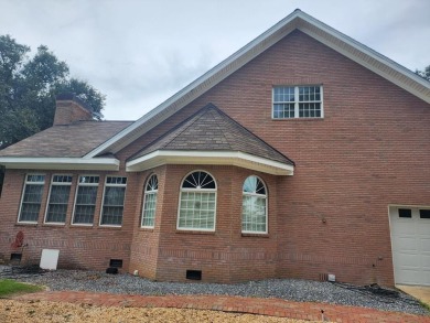 This Stunning 3-Bedroom Luxury Home with 4.5 Baths & Upstairs on Donalsonville Country Club in Georgia - for sale on GolfHomes.com, golf home, golf lot
