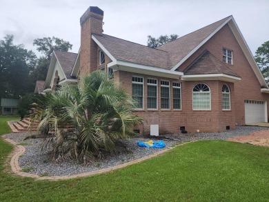 This Stunning 3-Bedroom Luxury Home with 4.5 Baths & Upstairs on Donalsonville Country Club in Georgia - for sale on GolfHomes.com, golf home, golf lot