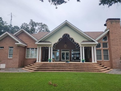 This Stunning 3-Bedroom Luxury Home with 4.5 Baths & Upstairs on Donalsonville Country Club in Georgia - for sale on GolfHomes.com, golf home, golf lot