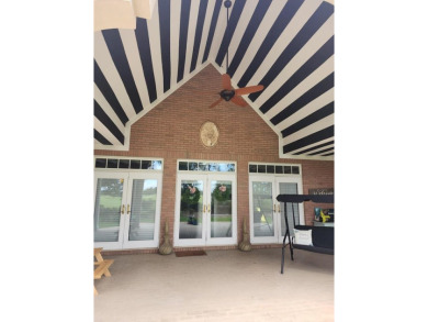 This Stunning 3-Bedroom Luxury Home with 4.5 Baths & Upstairs on Donalsonville Country Club in Georgia - for sale on GolfHomes.com, golf home, golf lot