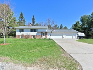 This property is ideally situated directly across from Pokegama on Pokegama Golf Course in Minnesota - for sale on GolfHomes.com, golf home, golf lot