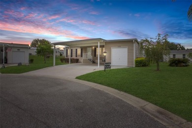 This practically NEW 2021 Built 3/2 Split plan home is located on Zellwood Station Country Club in Florida - for sale on GolfHomes.com, golf home, golf lot
